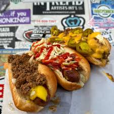 Brooks' Sandwich House signature dishes  Burger "All The Way" (mustard, onions, chili), Hot Dog "All The Way," Chili (by itself or as a topping), French Fries.